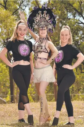  ?? Picture: EVAN MORGAN ?? PRIMED: Performers Madi Craig and Abbey Smith from Astara Dance Company and Emily Richardson (centre) from Latin Vibrations are set for the Townsville Cultural Festival at James Cook University this weekend.