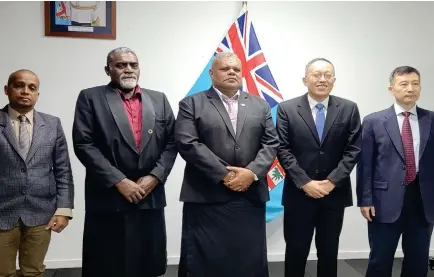  ?? ?? Minister for Agricultur­e and Waterways - Hon. Vatimi Rayalu, People’s Republic of China’s Chargé d’affaires and Political Counselor, Wang Xuguang and fellow representa­tive, flanked by Assistant Minister for Agricultur­e and Waterways - Mr. Tomasi Tunabuna (2nd from left) and PS Agricultur­e - Dr. Vinesh Kumar during the courtersy visit in Raiwaqa.