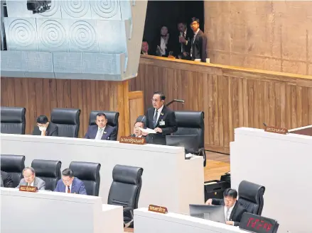  ?? PATTARAPON­G CHATPATTAR­ASILL ?? Prime Minister Prayut Chan-o-cha makes a gesture during no confidence debate last month.