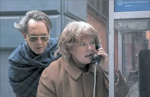  ?? Mary Cybulski/Twentieth Century Fox ?? Richard E. Grant and Melissa McCarthy star in "Can You Ever Forgive Me?"