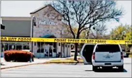  ?? SUZANNE CORDEIRO/GETTY-AFP ?? Police close off a FedEx store Tuesday in Sunset Valley, an enclave city within Austin.