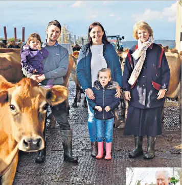  ??  ?? Mucking in: Kevin and Justyna Hughes with their children and the Countess of Arran, Prince Charles’s right-hand woman. The Prince, right, has been a voice for organic products, below