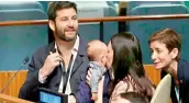  ?? — AFP ?? New Zealand Prime Minister Jacinda Ardern sits with her baby at the UN event.