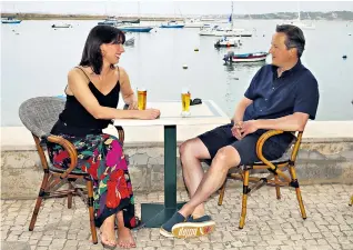  ??  ?? The Camerons on holiday in Alvor, Portugal, revealing that the Prime Minister has resorted to FitFlops to help him stay in shape