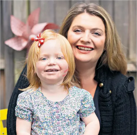  ??  ?? Bryony Gordon, with Edie, recalls ‘how little having a working mother impacted on me’