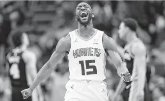  ?? Chuck Burton / Associated Press ?? Kemba Walker is expected to leave the Hornets to sign a free-agent deal with the Celtics, according to league sources. Negotiatio­ns can begin on Sunday.