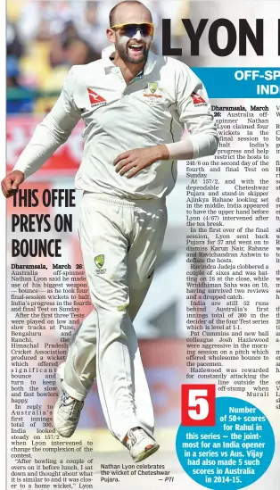  ?? — PTI ?? Nathan Lyon celebrates the wicket of Cheteshwar Pujara.