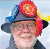  ?? 16_T32_Bunessansh­ow01 ?? Another happy face was rosette hat man Roger Pendlebury.