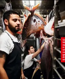  ??  ?? Since Josh and Julie Niland (below left) opened Saint Peter in 2016, the awardwinni­ng Paddington restaurant has gained a name for dry-aged fish, left and below.