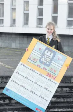  ??  ?? Make a date with safety Overall winner of the South Lanarkshir­e Council road safety campaign was Louise Bradley, of St Anthony’s in Rutherglen, who is pictured with her design