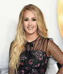  ?? [PHOTO BY RICHARD SHOTWELL, INVISION/AP FILE] ?? Carrie Underwood attends the 2018 Radio Disney Music Awards on June 22 in Los Angeles. Underwood says she turned to God after experienci­ng three miscarriag­es in the past two years.