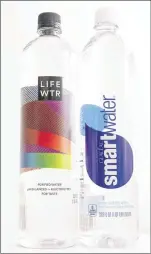  ?? MATT ROURKE / ASSOCIATED PRESS ?? PepsiCo ran an ad for its new Lifewtr during the Super Bowl, promoting the drink in a spotlight typically reserved for sodas. Smartwater, owned by a Coke subsidiary, has enjoyed sales growth in North America. It is billed as “vapor distilled” and features actress Jennifer Aniston in its ads. Both Lifewtr and Smartwater are made with municipal water and were recently selling for $2.79 for a 1-liter bottle at a 7-Eleven in New York City.