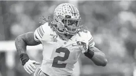  ?? PAUL SANCYA/AP ?? Ohio State defensive end Chase Young is the type of elite player the Ravens might consider trading up to draft, but the team generally refrains from making such moves.