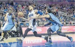  ?? PHELAN M. EBENHACK/ASSOCIATED PRESS ?? Before Friday’s win in Portland, one of the Magic’s best victories this season came on Dec. 26 against Memphis as guard D.J. Augustin helped Orlando win.