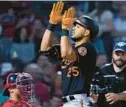  ?? SCHWALM/AP MARY ?? The Orioles’ Anthony Santander celebrates after hitting a two-run home run against the Red Sox during the fourth inning of Friday night’s game in Boston.