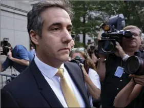  ??  ?? In this Aug. 21, file photo, Michael Cohen, former personal lawyer to President Donald Trump, leaves federal court after reaching a plea agreement in New York. AP PHOTO/CRAIG RUTTLE