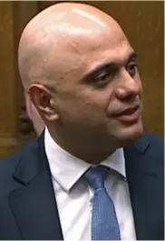  ??  ?? Composed: Sajid Javid addresses Boris Johnson and the Commons yesterday