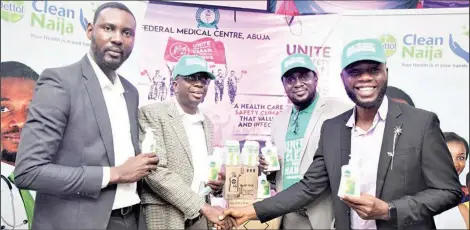  ?? ?? Area Sales Manager Reckitt Nigeria Limited, Okpanachi Simon; Deputy Head of Clinical Services, Research and Training Federal Medical Center Abuja, Dr. Bioku Muftau; Deputy Head of Clinical Services, FMC, Abuja, Dr. Omage Christophe­r and Reckitt Regional Manager, North, Victor Okafor, during the Reckitt donation of items to FMC in commemorat­ion of world hand Hygiene day in Abuja.