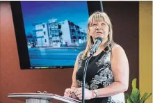  ?? JULIE JOCSAK
TORSTAR ?? Donna Woiceshyn, the chief executive officer of Niagara Regional Housing speaks during the official opening ceremony for the new Niagara Region affordable housing project at 527 Carlton Street Friday.