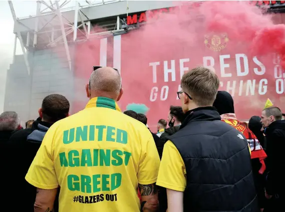  ?? Barrington Coombs ?? Manchester United fans protesting against the Glazer family before Sunday’s scheduled Premier League match against Liverpool at Old Trafford.