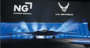  ?? MARCIO JOSE SANCHEZ/THE ASSOCIATED PRESS ?? The B-21Raider stealth bomber is unveiled at Northrop Grumman on Friday, Dec. 2, in Palmdale, Calif.