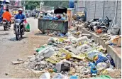  ?? — S. SURENDER REDDY ?? Garbage piled up on the road posing health hazard at Balamrai in Secunderab­ad.
THE GARBAGE collection agent is demanding abnormal sums of money for collecting garbage and asking the associatio­n to buy an autoricksh­aw for himself, an SCB resident wrote to the board CEO>