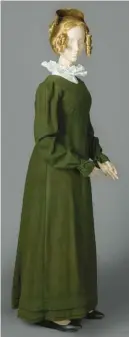  ?? ?? This green gown, made of wool around 1815, is remarkable because it has survived: Many woolen garments of the day were destroyed by moths and carpet beetles.