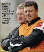  ??  ?? ON THE LINE: Down nY coach Paul Flynn(left) with manager Gerard Monan