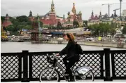  ?? AFP ?? Cycling is catching on fast in Moscow, but riders want more dedicated lanes