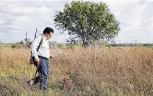  ?? Jerry Lara / Staff photograph­er ?? Total Comm owner Weston Martinez marks an area for a portable internet and cell tower in Atascosa County.