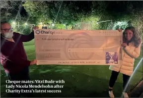  ?? ?? Cheque mates: Yitzi Bude with Lady Nicola Mendelsohn after Charity Extra’s latest success