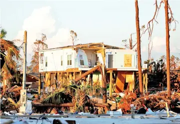  ??  ?? Damage caused by Hurricane Michael is seen in Mexico Beach, Florida, US. — Reuters photo