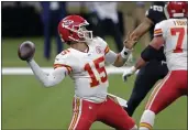  ?? BRETT DUKE — THE ASSOCIATED PRESS ?? Kansas City Chiefs quarterbac­k Patrick Mahomes (15) passes in the first half against the New Orleans Saints in New Orleans on Sunday.