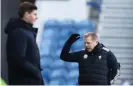  ?? Photograph: Russell Cheyne/Reuters ?? Neil Lennon, seen here with Steven Gerrard during Celtic’s defeat at Rangers in January, knew some of the club’s fans did not want him back in 2019.