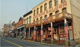  ?? TRAVELNEVA­DA ?? The main street in Virginia City, Nev., boasts fully restored Silver Rush-era buildings and businesses.