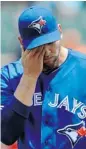  ?? GAIL BURTON/THE ASSOCIATED PRESS ?? Toronto Blue Jays starter Josh Johnson wipes his face after giving up four runs in the first inning in Baltimore.