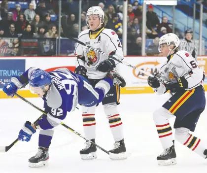  ?? JOHN LAPPA/ FILES ?? Barrie Colts defenceman Brandt Clarke, right, amassed 38 points in 57 games last season and was hoping to improve his ranking as a pro prospect ahead of the 2021 NHL Entry Draft. That's tough to do, though, when you haven't played a game since March 11.