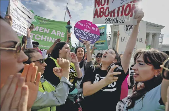  ?? PHOTOGRAPH: ANDREW HARNIK/GETTY IMAGES ?? Abortion rights supporters rallying outside the supreme court as Idaho’s law was debated by the judges