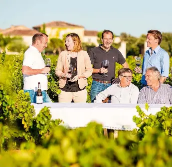  ??  ?? Above: the Perrin family, owners of Château de Beaucastel, Châteauneu­f-du-Pape