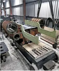  ?? MIKE SOLLOWAY ?? The new cylinder castings and front extension frames for GWR ‘2884’ 2-8-0 No. 3850 being assembled upside down at the Gloucester­shire Warwickshi­re Steam Railway.