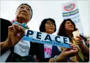  ?? CHUNG SUNG-JUN / GETTY IMAGES ?? Activists gather in front of the U.S. Embassy in Seoul, South Korea, on Friday to demand peace for the Korean peninsula after the cancellati­on of the U.S. and North Korea summit.