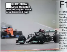  ??  ?? SLIDE SHOW: Lewis Hamilton tries to stay on track at a drenched Spa