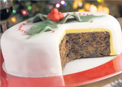  ??  ?? Treats like Christmas cake can still be enjoyed by diabetics – provided it is in small amounts