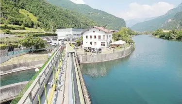  ?? Ansa ?? Energia “pulita” Una centrale idroelettr­ica dell’Enel in Veneto
