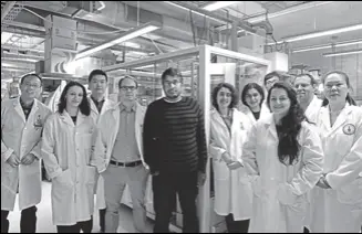  ?? CHRISTINE MISQUITTA, UNIVERSITY OF TORONTO ?? Sidhu with his colleagues in his lab at the University of Toronto.