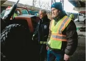  ?? ZBIGNIEW BZDAK/TRIBUNE ?? Tom Carney, right, of the Chicago Department of Transporta­tion, tours a Lake Shore Drive constructi­on site with then-Mayor Rahm Emanuel on Feb. 12, 2019. Carney has been named head of CDOT.