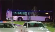  ?? PTI ?? A bus transports people from the scene of a shooting at the FedEx Ground facility in Indianapol­is on Thursday night.