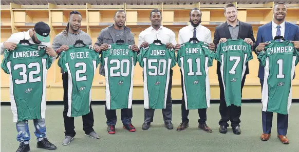  ?? DON HEALY ?? Of the Saskatchew­an Roughrider­s’ showcased free-agent signings from Feb. 11, 2016 — left to right: Kendial Lawrence, Curtis Steele, Otha Foster III, Greg Jones, Ed Gainey, Justin Capicciott­i and Shamawd Chambers — only Gainey and Foster turned out to...