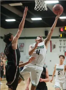  ?? BEA AHBECK/NEWS-SENTINEL ?? Above: Liberty Ranch's Jamie Gonzalez goes up for two as Bear River's Caleb Lowry defends during their playoff game in Galt on Friday. Below: Liberty Ranch's Jalen Patterson drives to the basket.