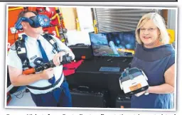  ??  ?? Darren Nisbet, from Portarling­ton fire station, tries out virtual training with MP Lisa Neville. Picture: GLENN FERGUSON